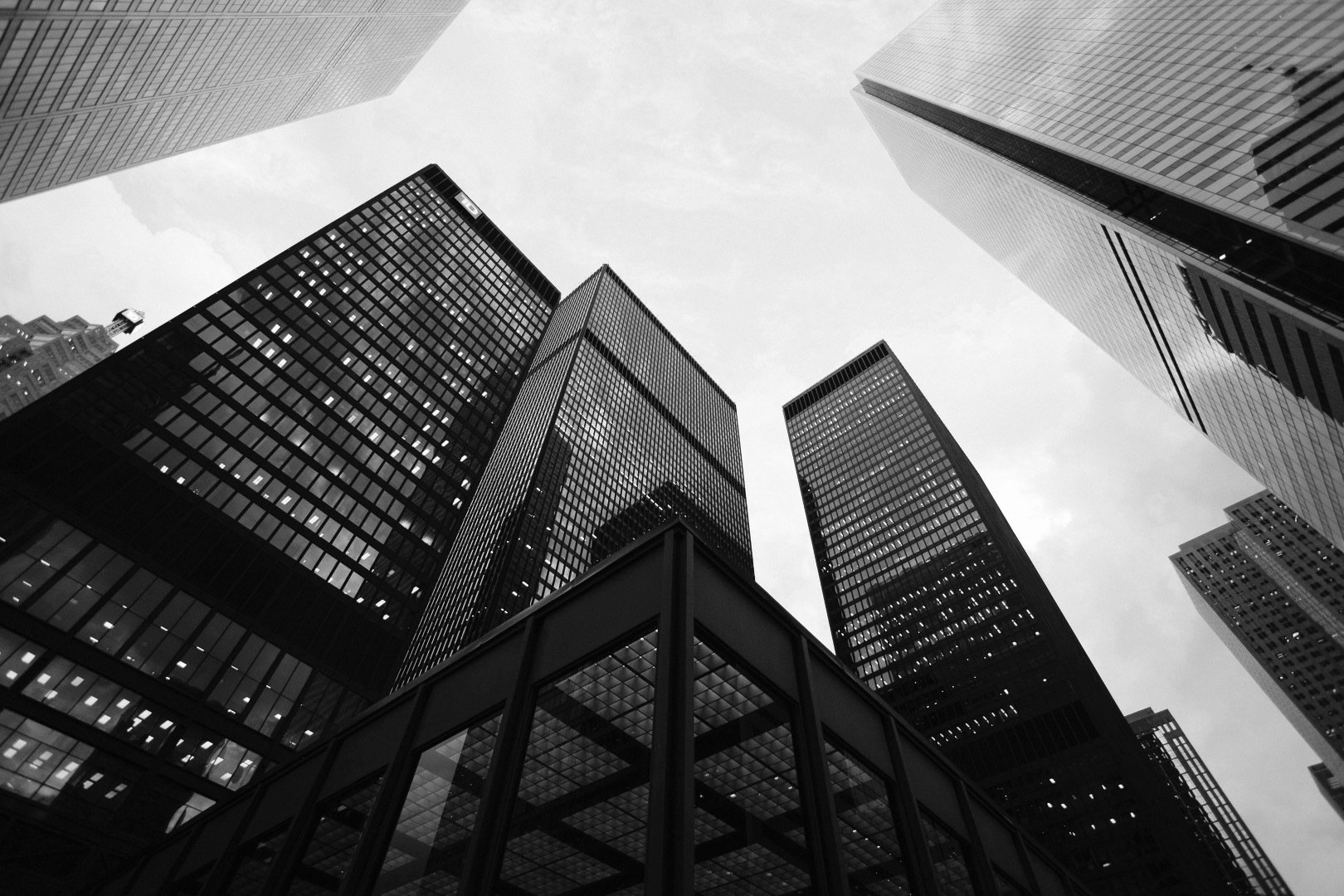 black and white photo of tall buildings